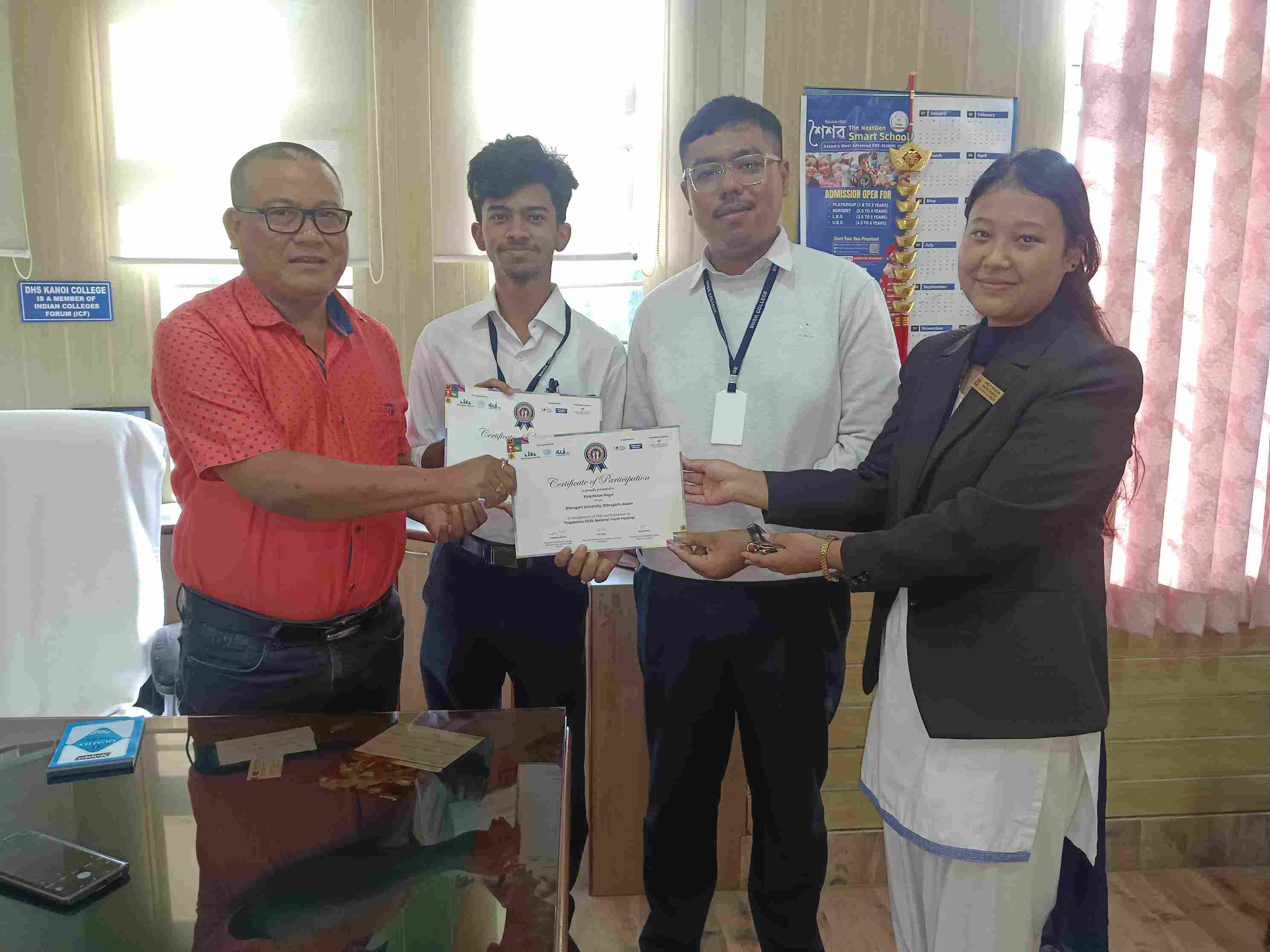 Representing Assam and Dibrugarh University at the Zonal Round of the Prajatantra National Youth Festival 2025 Biraj Ballav Gogoi in Op-Ed Writing and Miran Chaliha in Policy Debate from DHSK College upheld the honour and intellectual prestige of our institution. Their journey reached this stage after securing selection at the State Level proving their passion, merit and hard work. The moment became truly memorable when the certificates were presented by the Principal of DHSK College